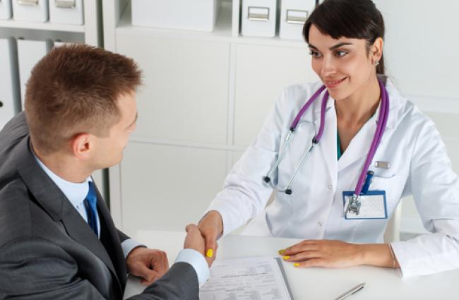 Doctor and patient shaking hands