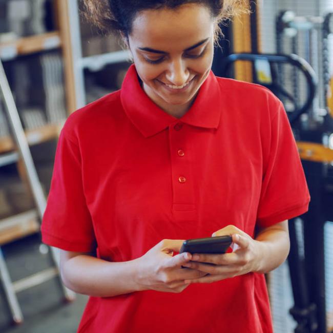 Young woman looking at her phone