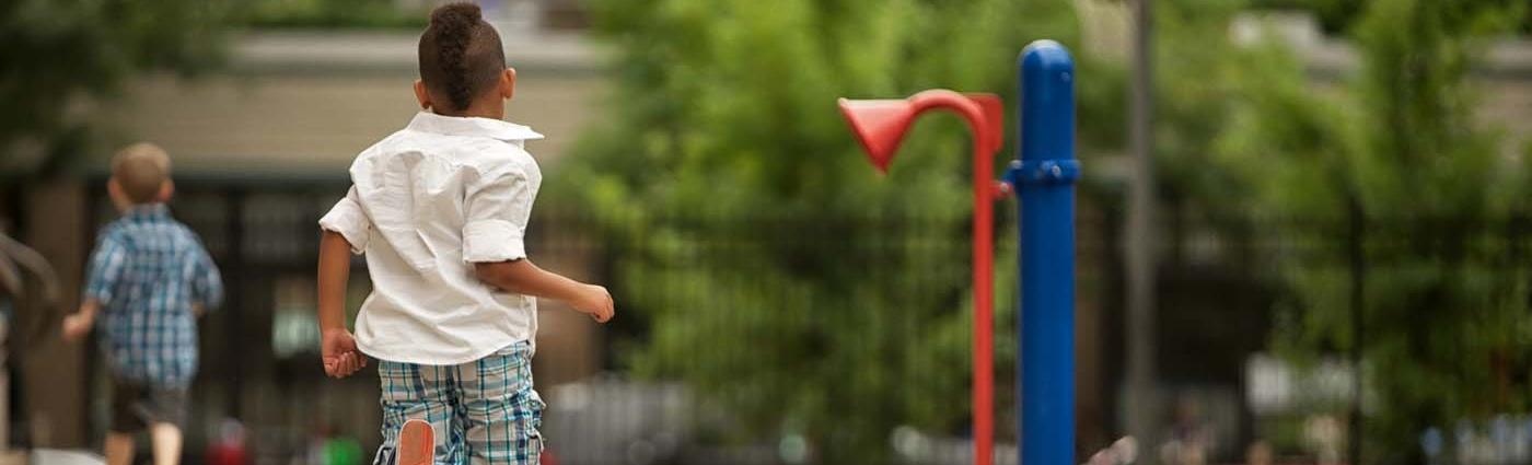 Children running in park